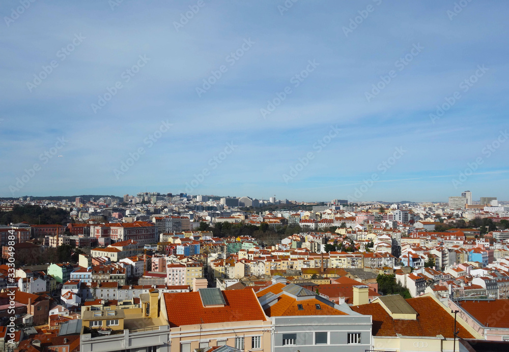 Lisbon city skyline with red roofs.