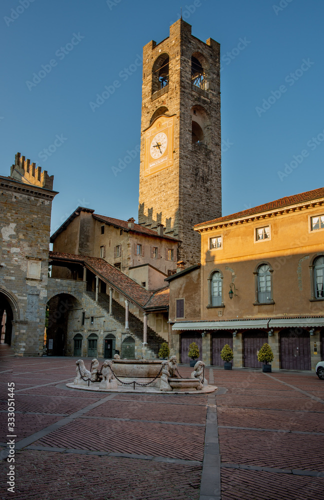 Bergamo old square with Christmas decorations illuminated for the holidays
