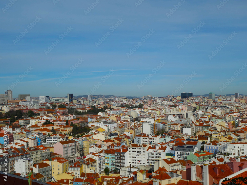 Lisbon city skyline with red roofs.