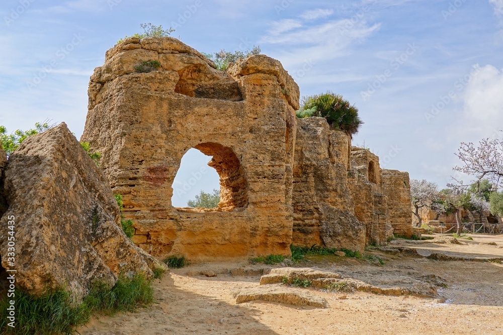 The historical walls with archs around the complex of Valley of the Temples (Valle dei Templi)