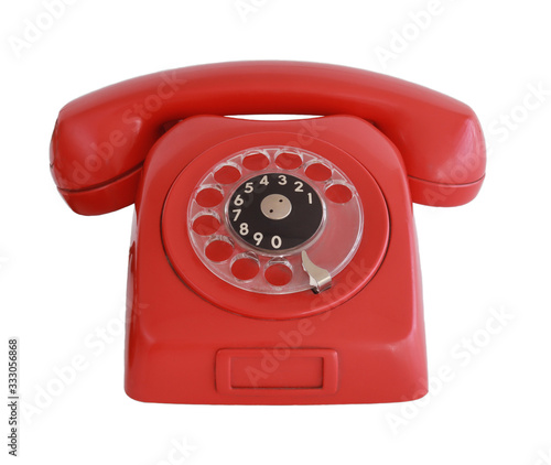 Vintage old red telephone isolated