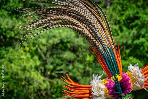 Closeup shot of the colorful feathers of a traditional Native Indian-American festive regalia