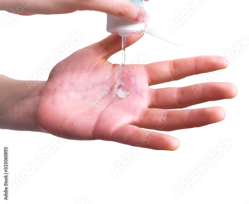 hand applying antibacterial gel on white background