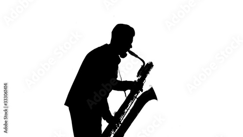 silhouette of a handsome saxophone musician, isolated, solo
