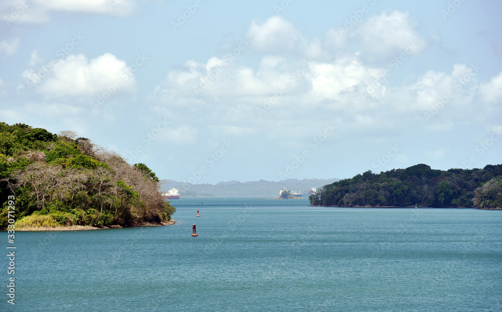 Landscape of the Panama Canal. View from the transiting cargo ship. 