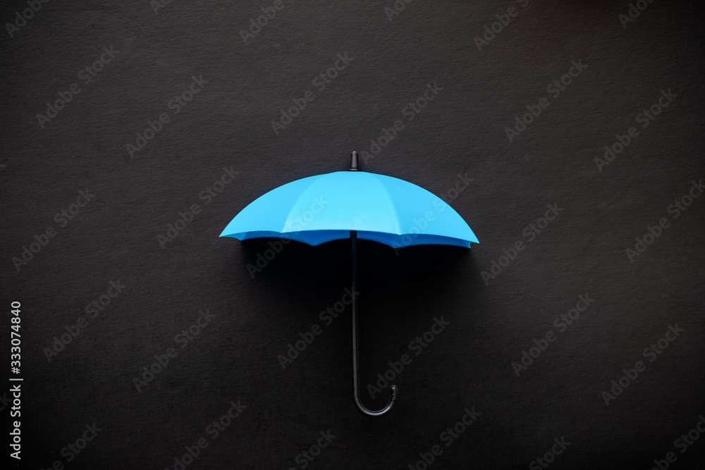Blue umbrella 3D icon isolated on black background