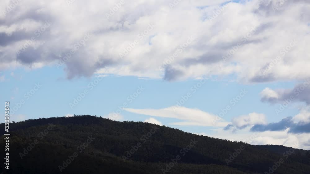 timelapse of clouds passing by and weather changing over the mountains, shot in Tasmania over Mount Wellington also called Kunanyi timelapse of clouds passing by and weather changing over the mountains, shot in Tasmania over Mount Wellington also called Kunanyi