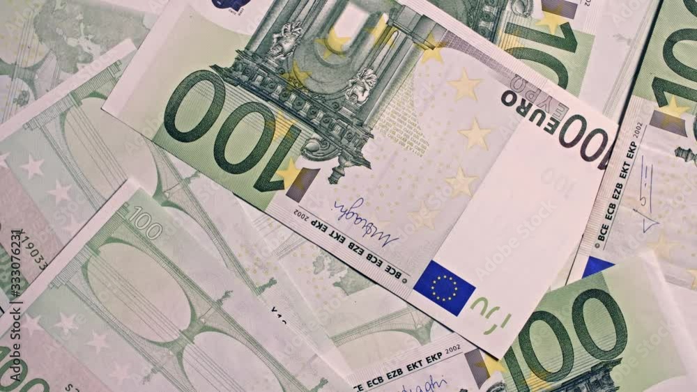 100 Euro notes close up macro shot, spinning in frame, 4k studio footage 100 Euro notes close up macro shot, spinning in frame, 4k studio footage