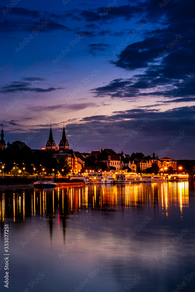 Night view of Moselle in Koblenz of Germany; peaceful lake and buildings