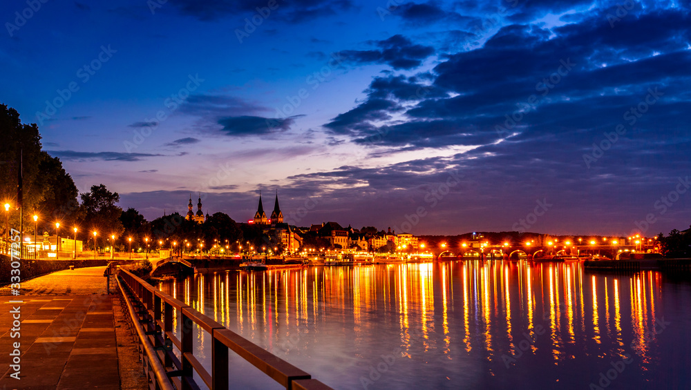 Obraz premium Beautiful night view of Moselle in Koblenz of Germany; brilliant lake and buildings