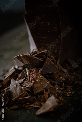 Chunks of dark chocolate with dark background