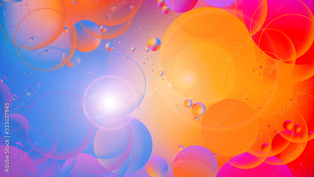 bright oily drops in water with colorful background, close-up bright oily drops in water with colorful background, close-up