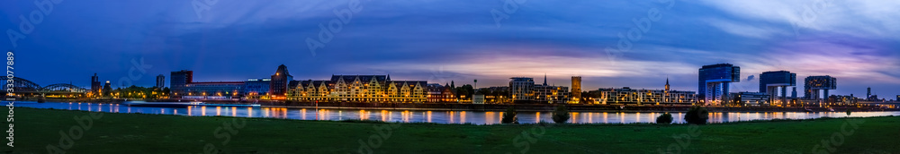 Panorama of beatiful night view: Cityscape and lakescape at nightfall in Cologne of Germany