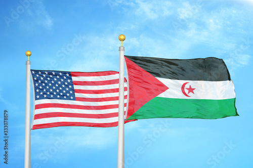 Wallpaper Mural United States and Western Sahara two flags on flagpoles and blue cloudy sky Torontodigital.ca