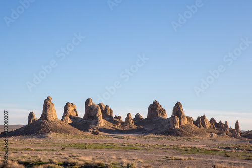 sun sets on tufa formations at Trona Pinnacles, California