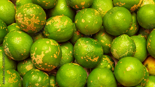 Rangpur, Citrus × limonia or Citrus reticulata × medica, sometimes called the rangpur lime, mandarin lime or lemandarin, is a hybrid between the mandarin orange and the citron photo