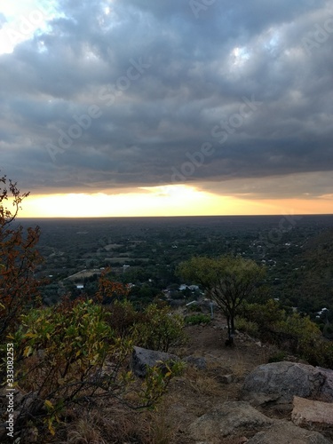 sunset in the city from the mountain