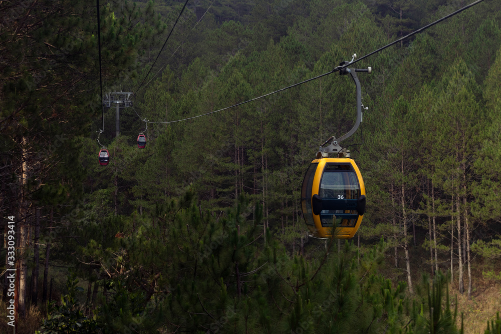 cable car taking tourist in Da Lat (Dalat) city, vietnam lake