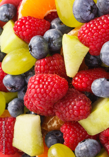 Fresh fruit salad as background  healthy nutrition concept
