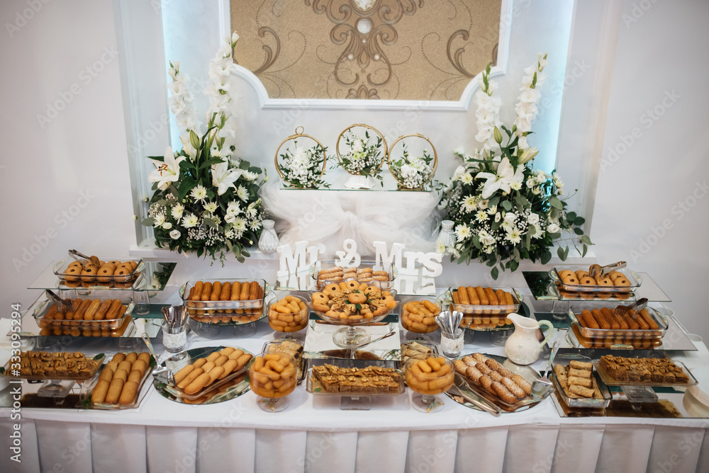A sweet table with biscuits and candy for a party