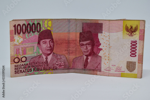 Close up one hundred thousand Indonesian Rupiah isolated on White Background. photo