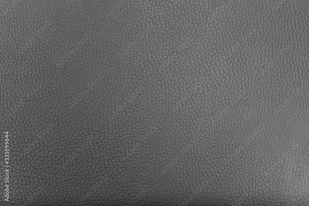 Abstract black leather texture may used as background.  Closeup of dark pattern