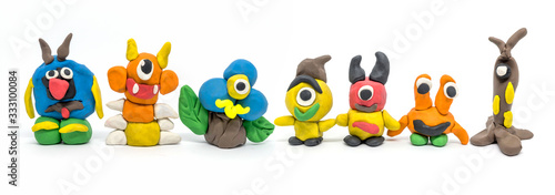 Play dough group monsters on white background. Handmade clay plasticine