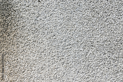 Wallpaper Mural Exposed aggregate concrete in closeup made of small pebbles in different grey color shade Torontodigital.ca