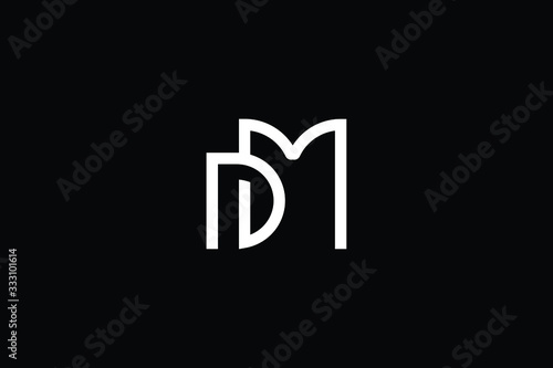 Minimal elegant monogram art logo. Outstanding professional trendy awesome artistic MD DM initial based Alphabet icon logo. Premium Business logo White color on black background