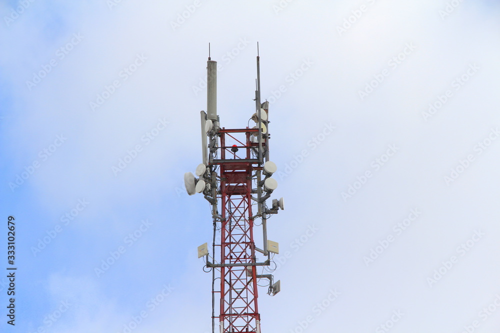 Base station mobile network antenna on a steel structure mast with a repeater. Base station mobile network antenna on a steel structure mast with a repeater.