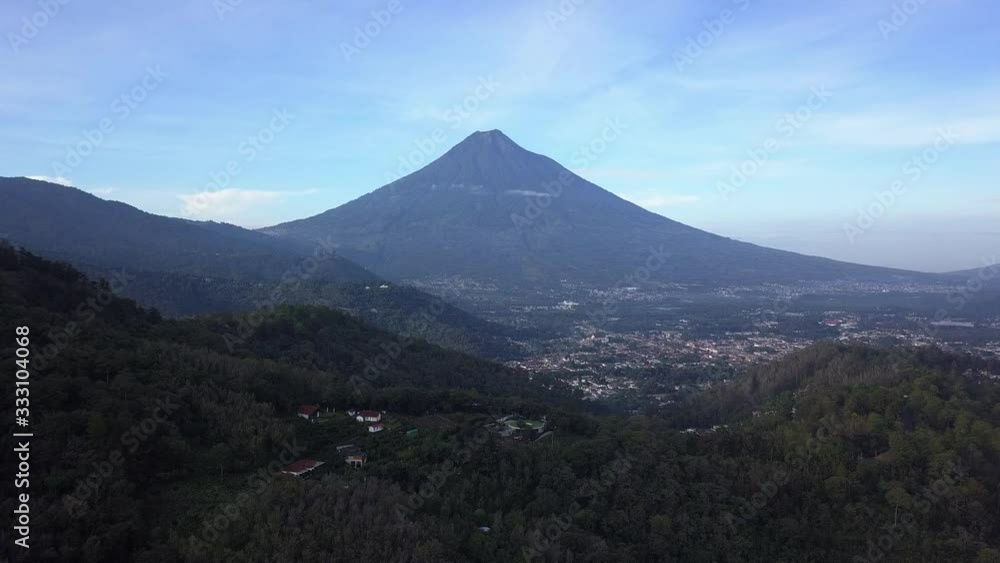 AERIAL: Vulcano in Antigua city in Guatemala AERIAL: Vulcano in Antigua city in Guatemala