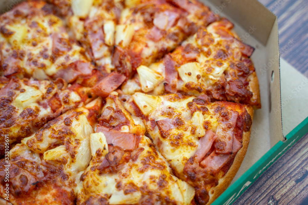 ham and pineapple on pizza in box ham and pineapple on pizza in box