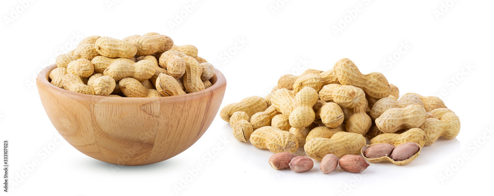 peanuts in wood bowl isolated on white background peanuts in wood bowl isolated on white background