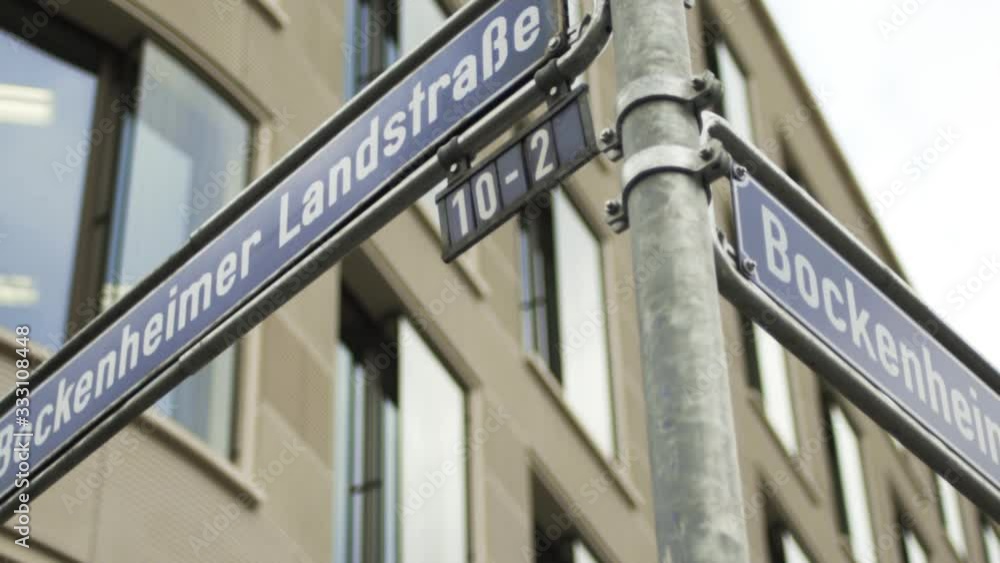 Street Sign Street Corner Pan Right To Left Bockenheimer Anlage Bockenheimer Landstraße Frankfurt Am Main, Germany Street Sign Street Corner Pan Right To Left Bockenheimer Anlage Bockenheimer Landstraße Frankfurt Am Main, Germany