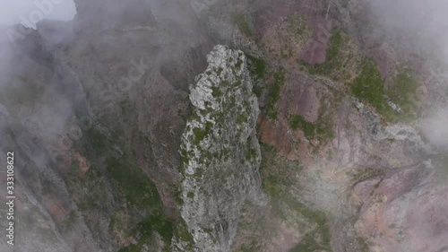 AERIAL: Misty rochy mountain in Madeira photo