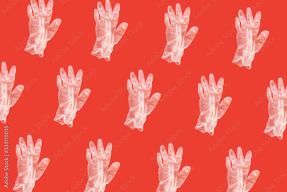latex glove on a red background