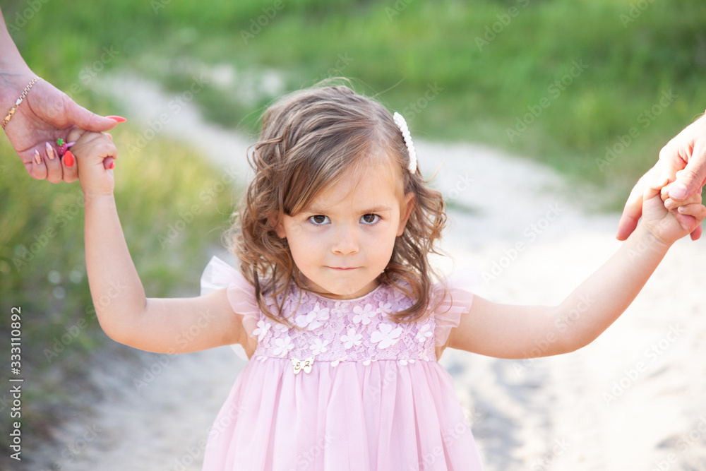 little girl holding parents hands little girl holding parents hands