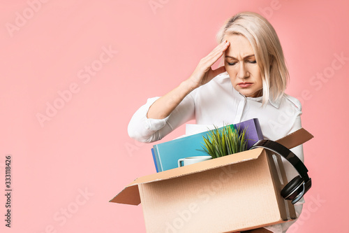 Sad fired mature woman with...