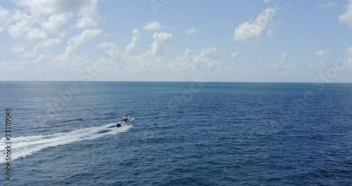 Aerial View of center console fishing boat in ocean