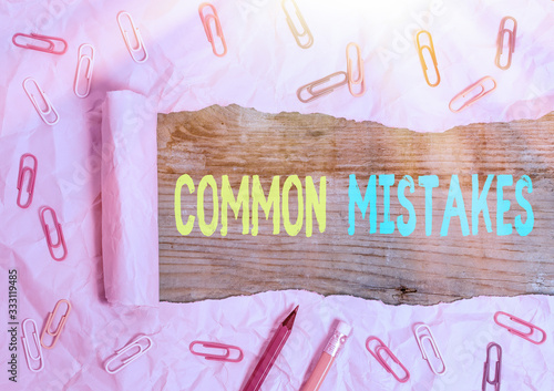 Writing note showing Common Mistakes. Business concept for actions that are often used interchangeably with error photo