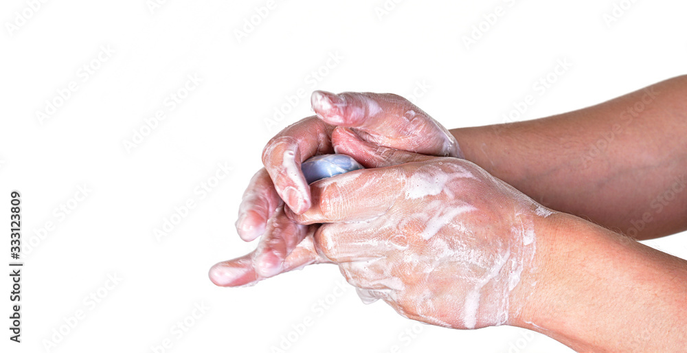 Young man washing hands with blue soap bar, isolated on white. Can be used during coronavirus covid-19 outbreak prevention Young man washing hands with blue soap bar, isolated on white. Can be used during coronavirus covid-19 outbreak prevention