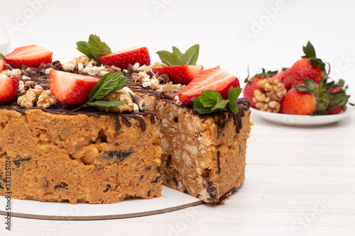 cake anthill with strawberries and nuts