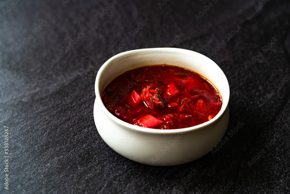 Traditional Russian Borscht Soup with Beetroot usually served with Sour Cream, Cheese or Yogurt / Borsch Beet. Traditional Russian Borscht Soup with Beetroot usually served with Sour Cream, Cheese or Yogurt / Borsch Beet.