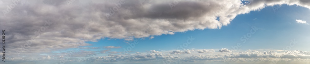 Fantastic clouds against blue sky, panorama Fantastic clouds against blue sky, panorama