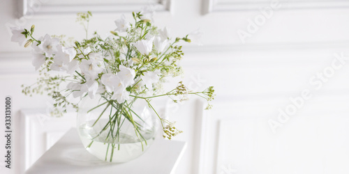 Fotografie Bouquet of gentle bells in vase