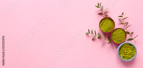 matcha tea in little jar on pink background. Concept healthy drink, copyspace, flatlay, top view, banner.