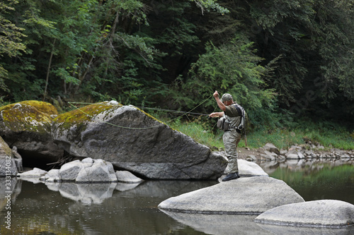 Fishing scene, newbie fly fisherman 