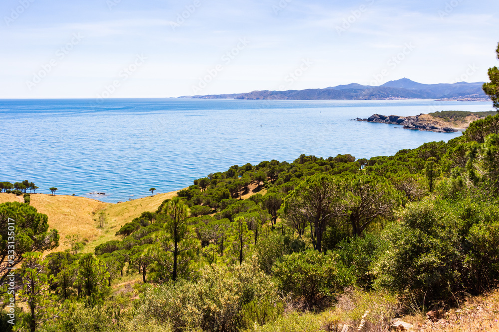 View from the viewpoint of the Canons of the southern coast with the Puerto of Selva in the background, Costa Brava, Catalonia, Spain