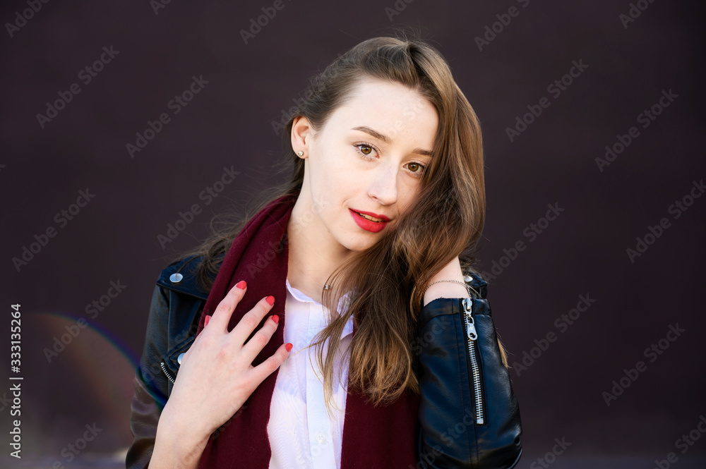 Spring portrait of a smiling beautiful girl with emotions in the sun outdoors Spring portrait of a smiling beautiful girl with emotions in the sun outdoors