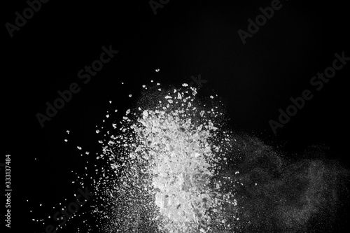 Gorgeous white powder pattern isolated on black background